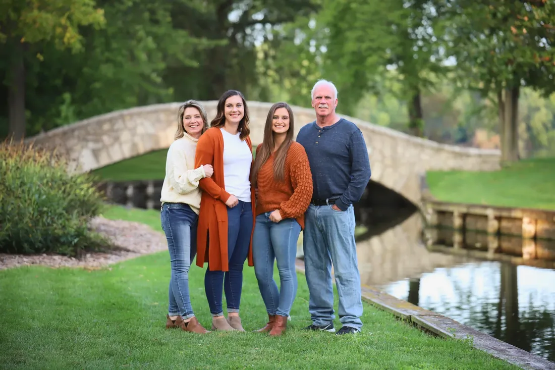 The family by the old stone bridge