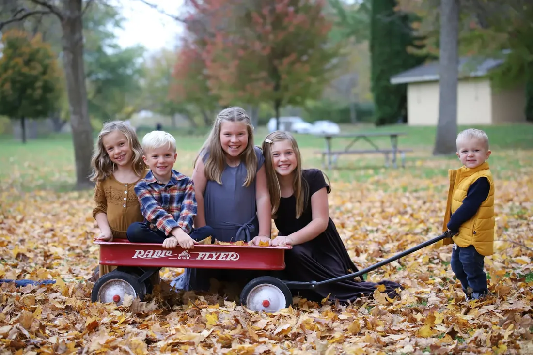 Everyone in the wagon, the youngest pulling