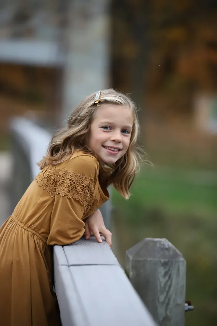 Leaning on the bridge rail