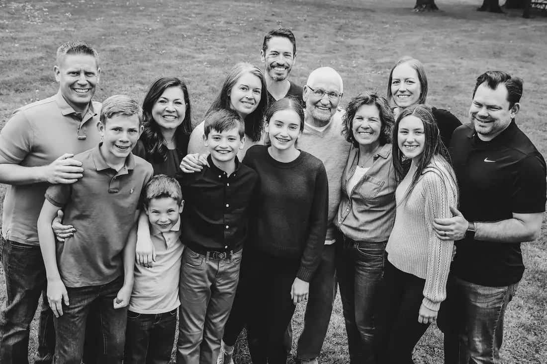 Three generations on one lawn, in black and white