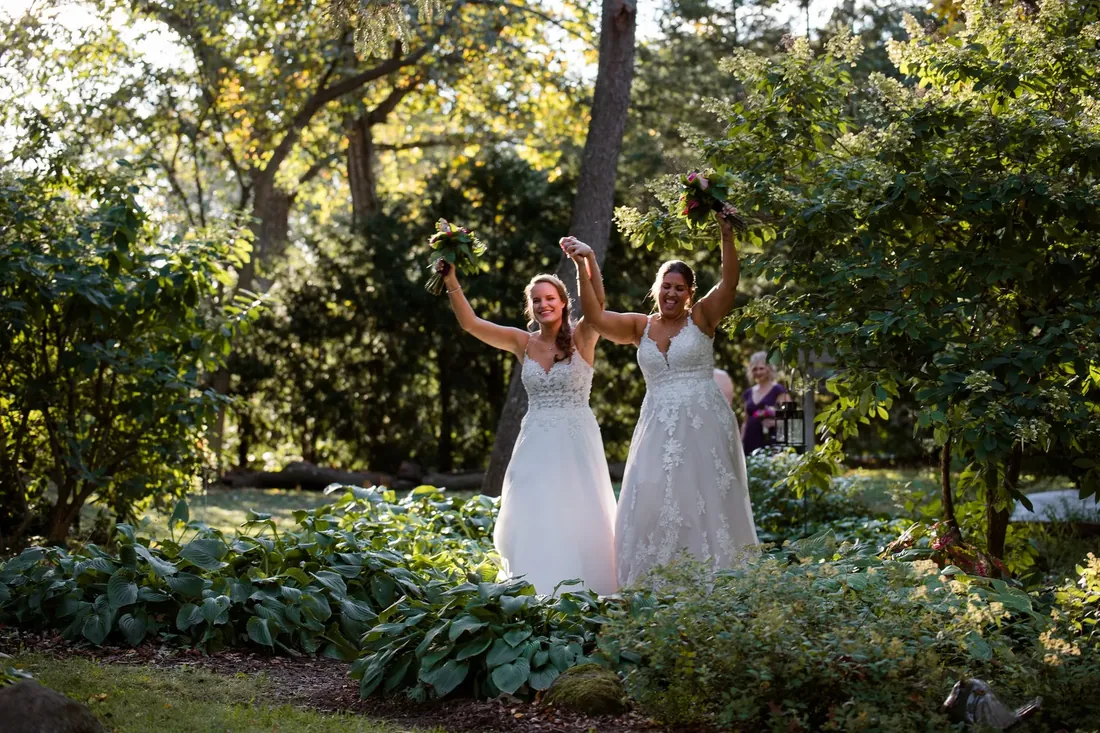 Cece & Erica: bouquets up in the garden