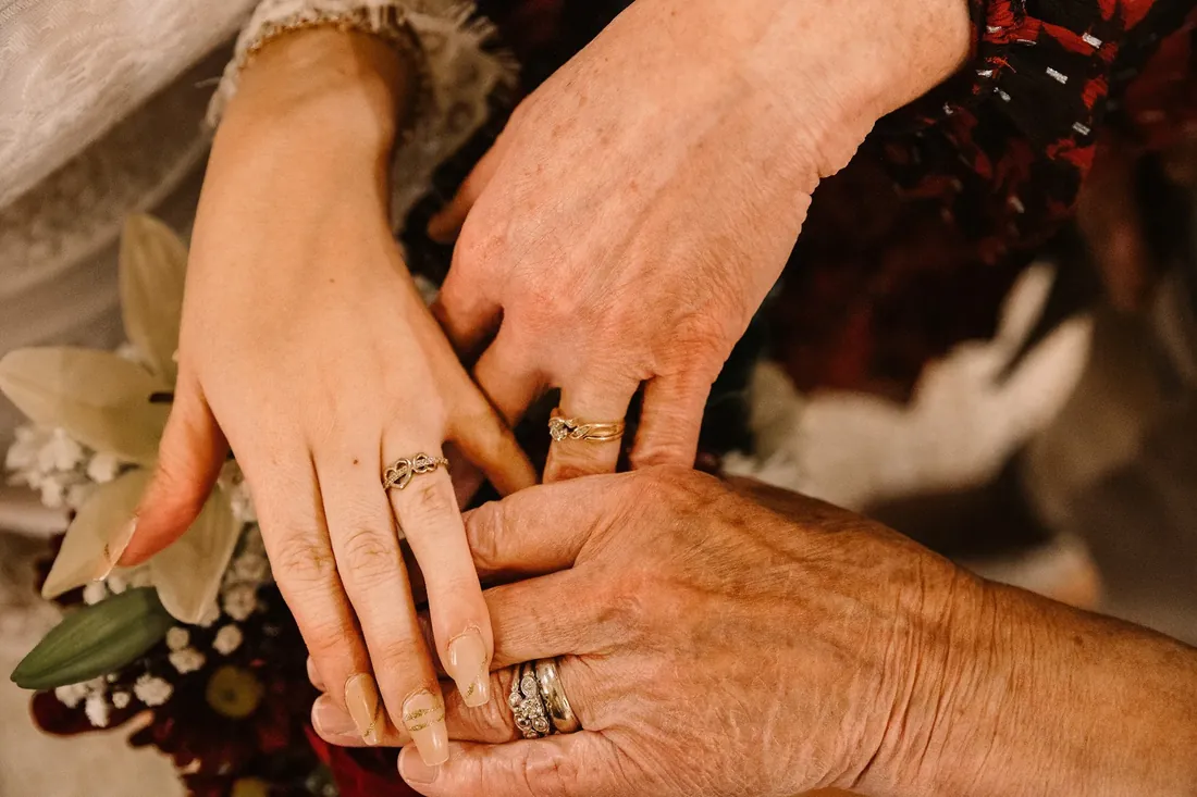 Emily & Samy: her new ring next to her grandmother’s hands