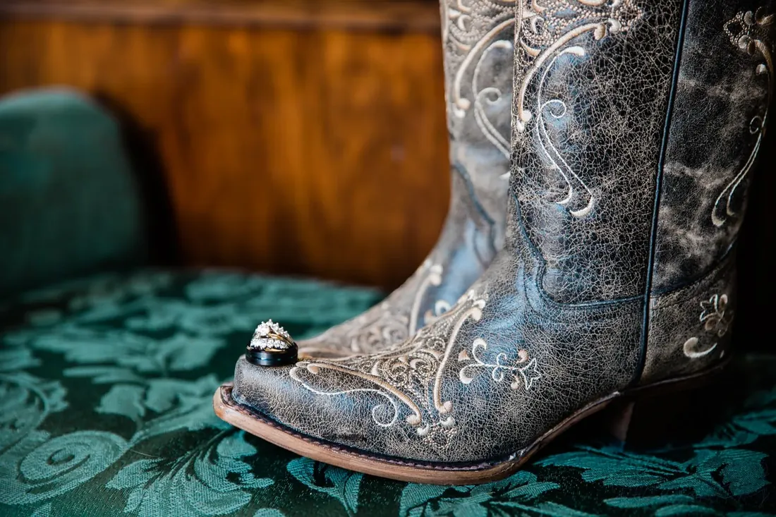 Mindy & TJ: the rings on the toe of her boot