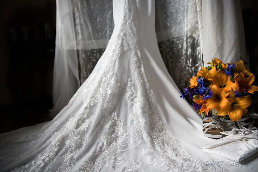 Theresa & Joe: the dress and her orange lilies
