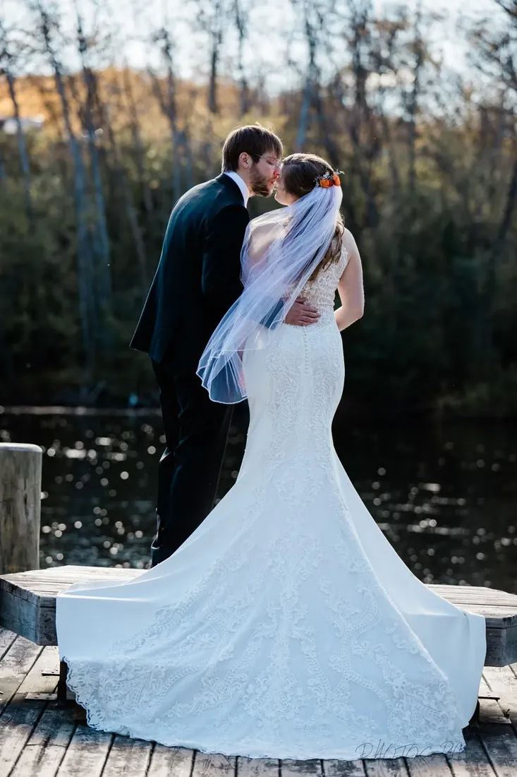 Theresa & Joe: a kiss on the dock, the train spread out