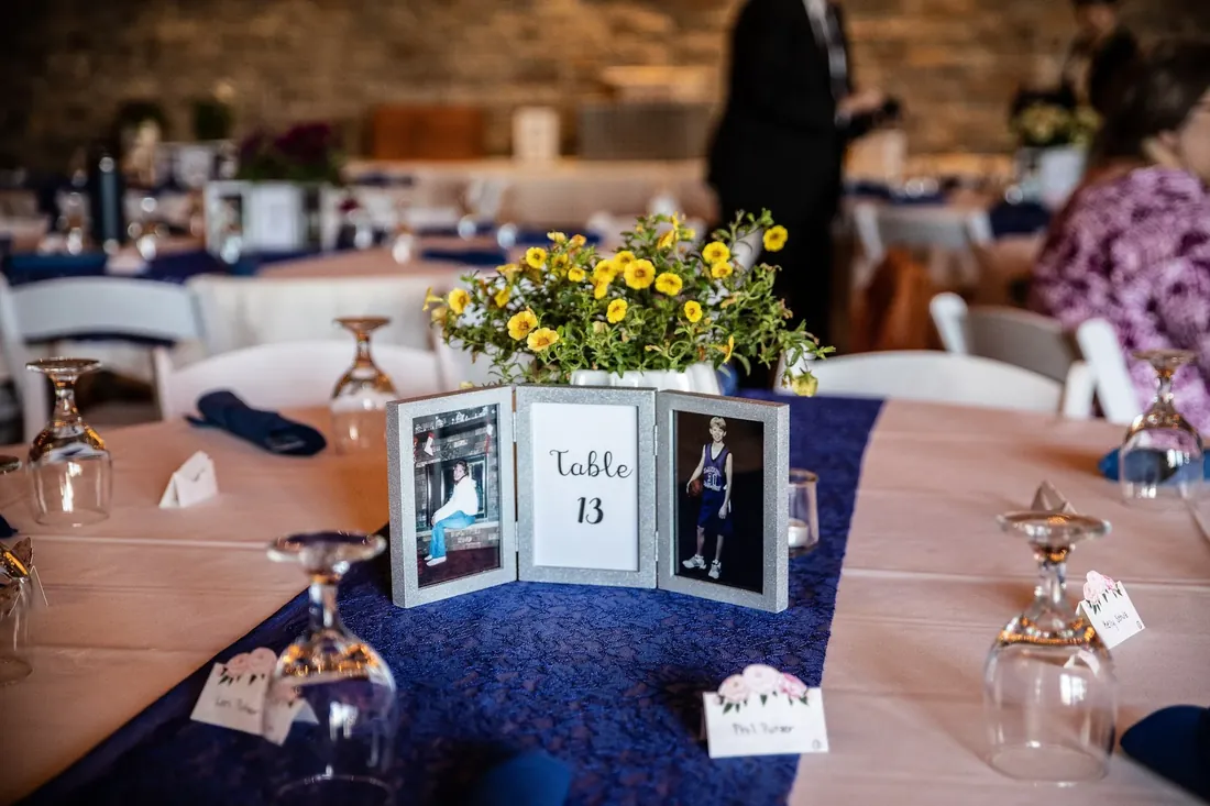 Trisha & Mark: table 13, with childhood photos in the frame