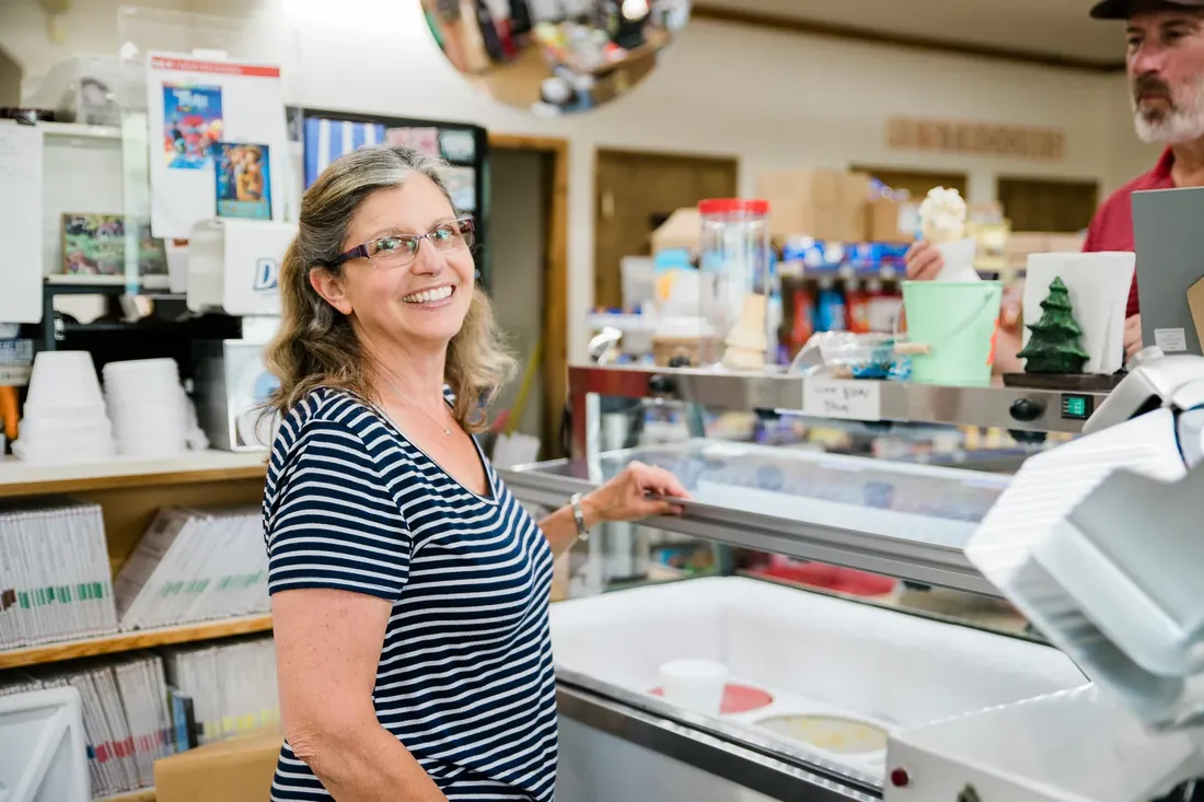A smile from behind the ice cream case