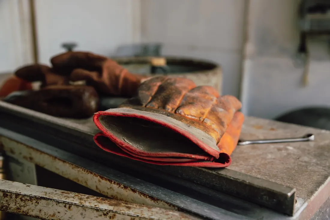 Work gloves, worn orange