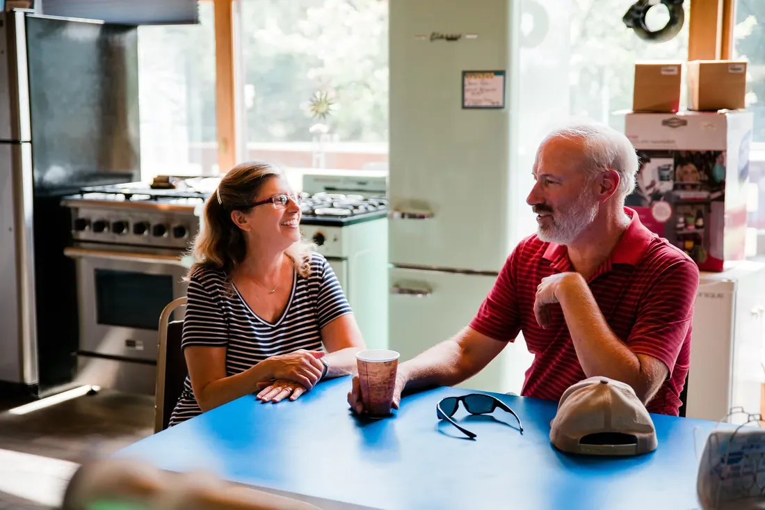 Coffee at the blue table, between the appliances
