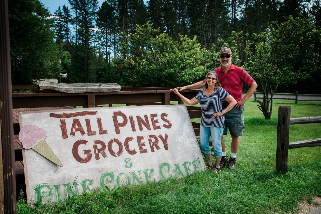 Next to the old Tall Pines Grocery sign