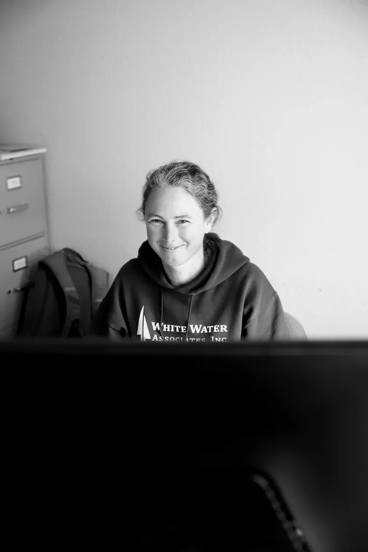 A smile over the top of the monitor