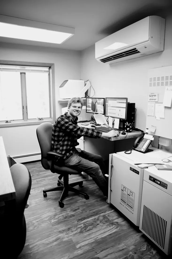 At the desk by the -86° freezer
